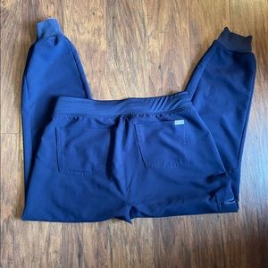 Figs. Medium petite Zamoras. One small spot under left pocket.